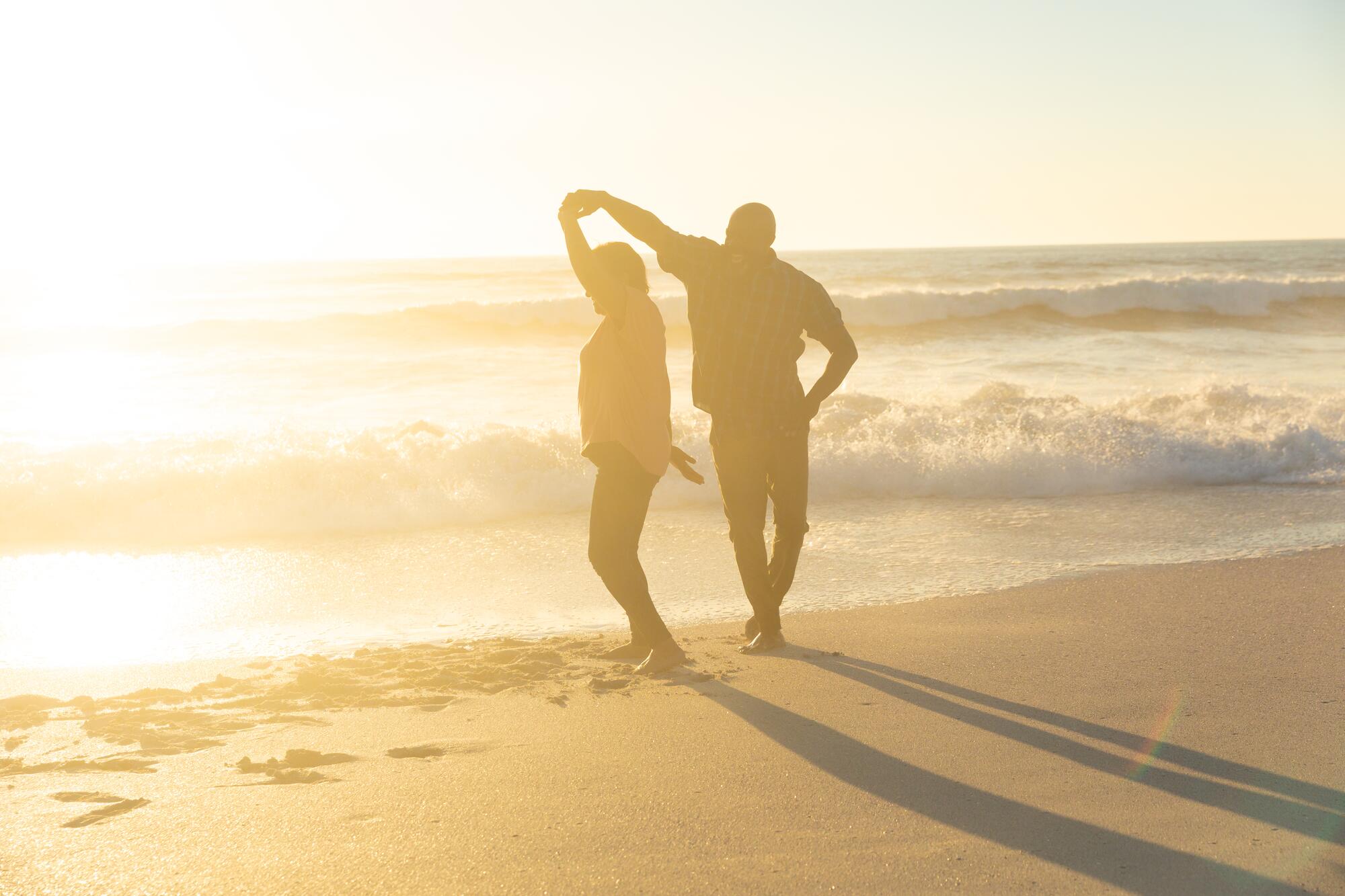 couple dancing on beach